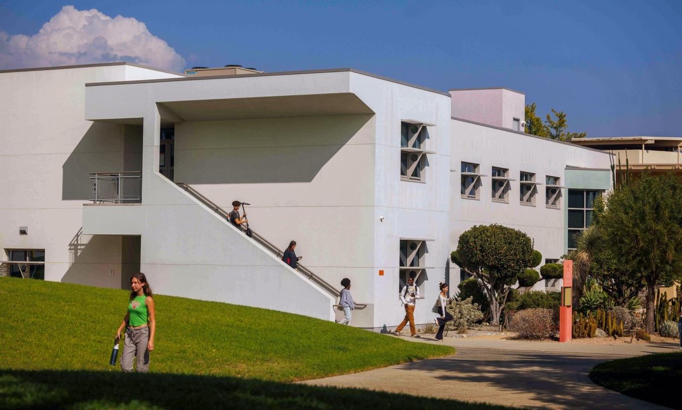 Students make their way down stairs at Bernard Hall